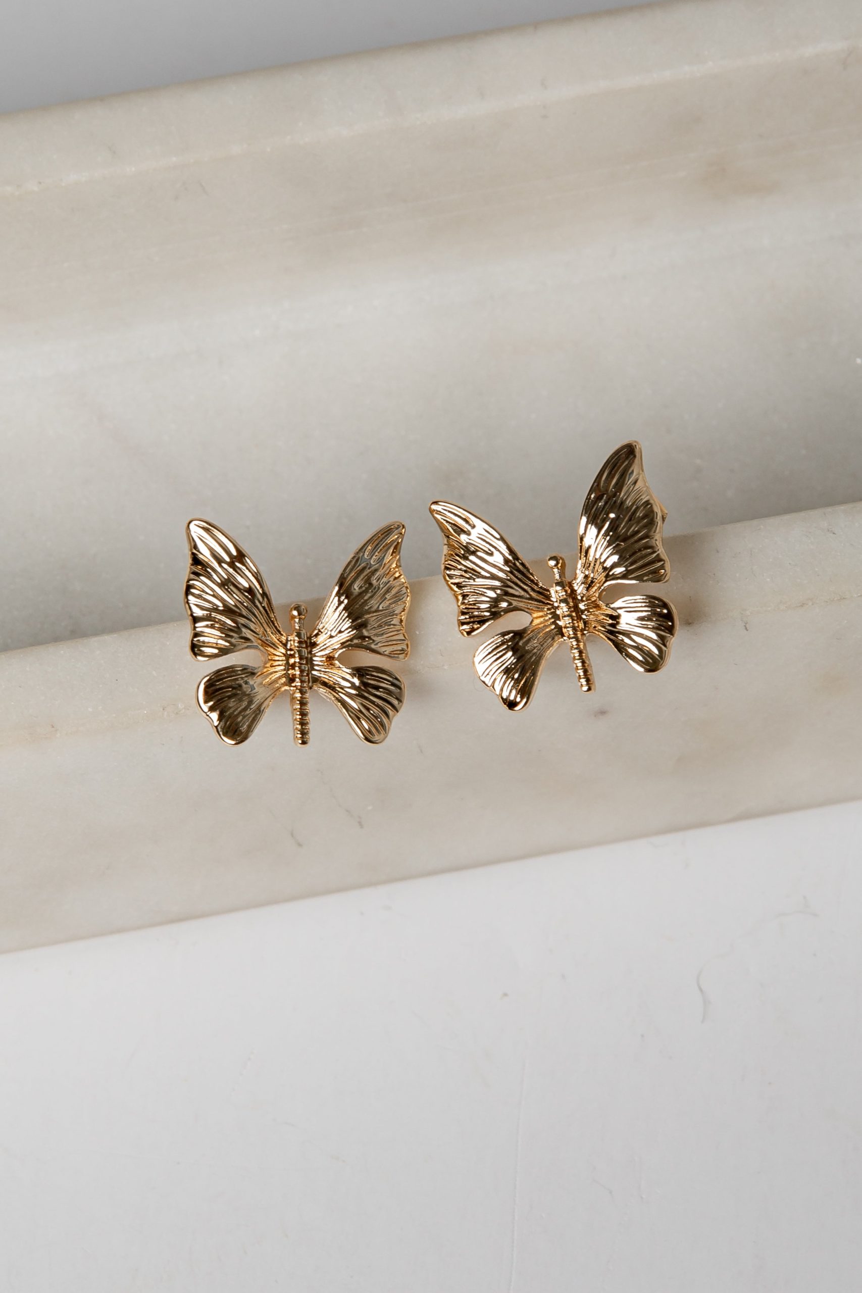 shopdressup_butterfly_stud_earrings_2846b773-1779-4e20-a190-85635035e2df.jpg